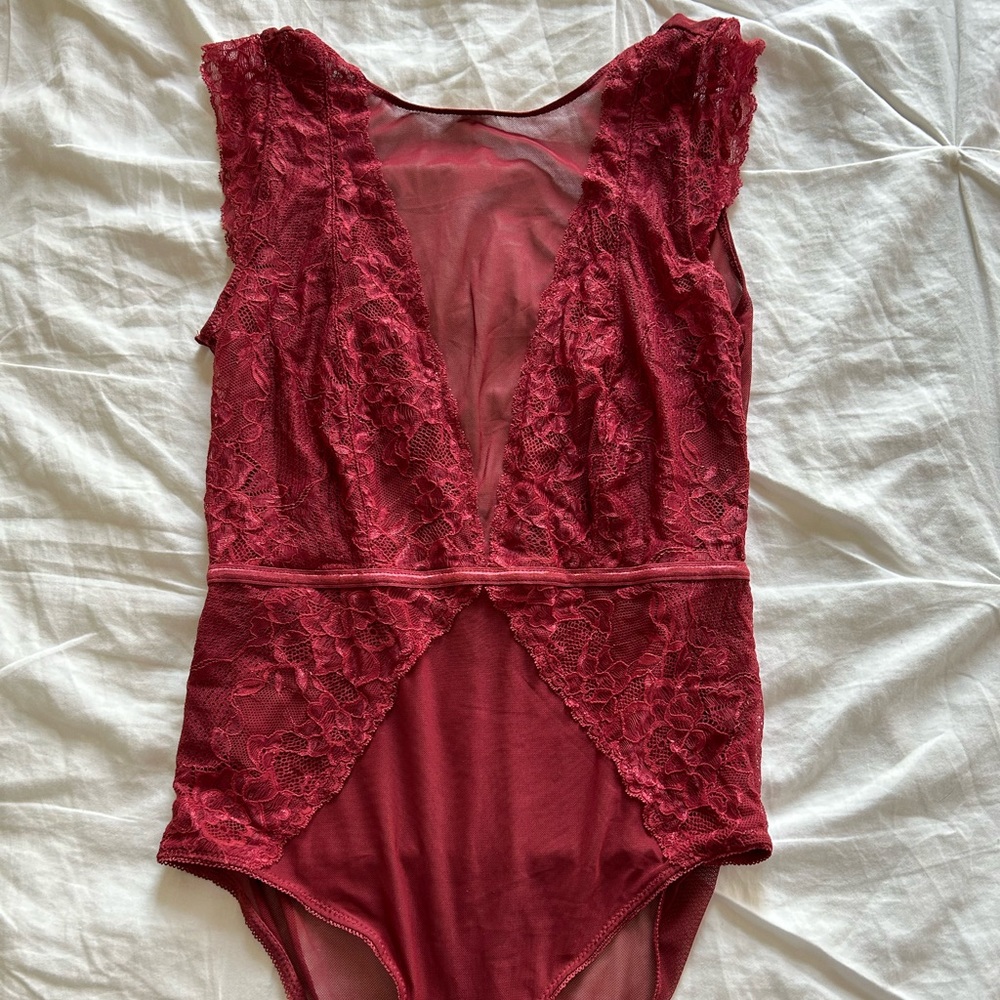 Daisy Fuentes sheer short sleeve bodysuit